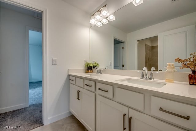11260 Canopy Loop, Fort Myers, FL 33913 - bathroom with double vanity, baseboards, and tile patterned flooring