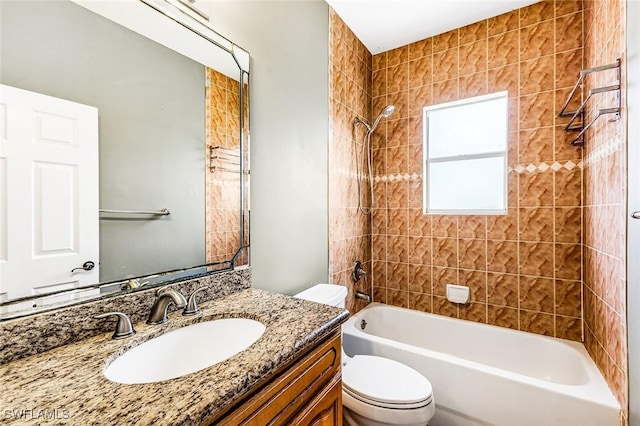 707 8th Ave, Lehigh Acres, FL 33972 - bathroom with toilet, vanity, and washtub / shower combination