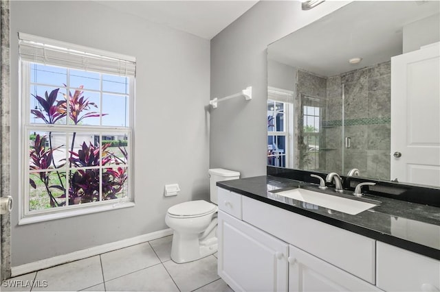 2903 NW 5th Pl, Cape Coral, FL 33993 - full bathroom with healthy amount of natural light, tile patterned floors, a stall shower, and baseboards
