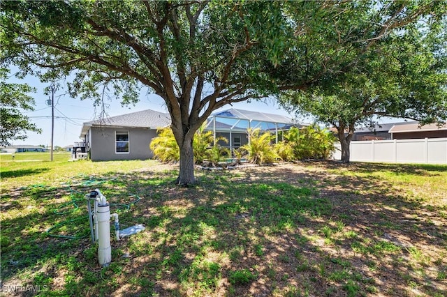 2903 NW 5th Pl, Cape Coral, FL 33993 - view of yard featuring a lanai