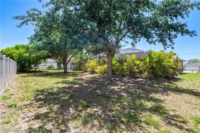 2903 NW 5th Pl, Cape Coral, FL 33993 - view of yard with a lanai