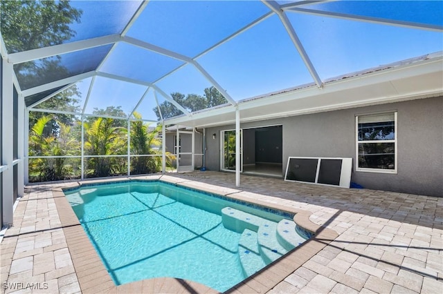 2903 NW 5th Pl, Cape Coral, FL 33993 - swimming pool featuring a patio area and a lanai
