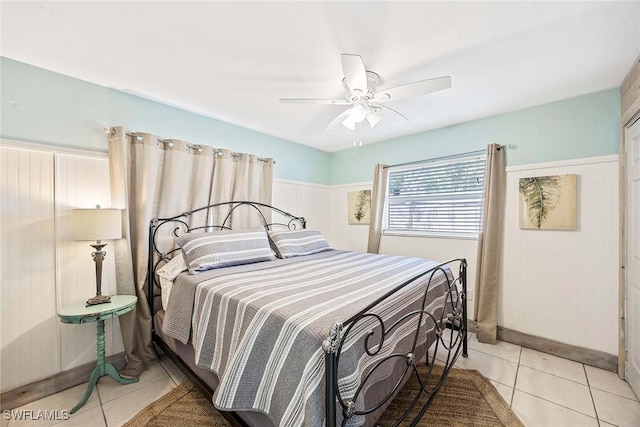 736 94th Ave N, Naples, FL 34108 - bedroom with light tile patterned flooring and ceiling fan