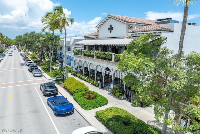736 94th Ave N, Naples, FL 34108 - view of building exterior featuring uncovered parking