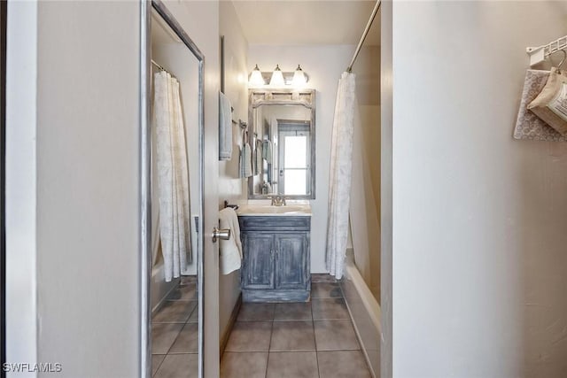 668 94th Ave N, Naples, FL 34108 - bathroom with shower / bath combination with curtain, vanity, and tile patterned flooring