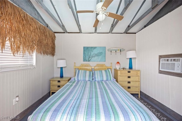 668 94th Ave N, Naples, FL 34108 - bedroom with wood finished floors and a wall mounted AC