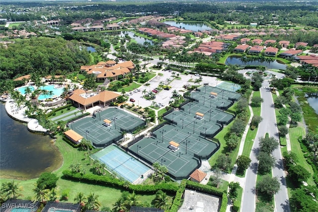 9731 Acqua Ct Unit 537, Naples, FL 34113 - aerial view of property and surrounding area featuring a nearby body of water, nearby suburban area, and a pool