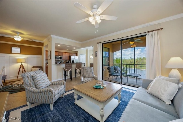 9731 Acqua Ct Unit 537, Naples, FL 34113 - living area featuring ceiling fan and ornamental molding