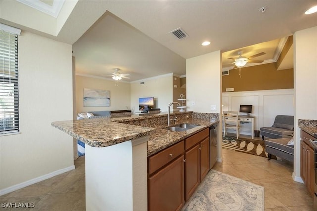 9731 Acqua Ct Unit 537, Naples, FL 34113 - kitchen with a sink, ceiling fan, open floor plan, dark stone countertops, and ornamental molding