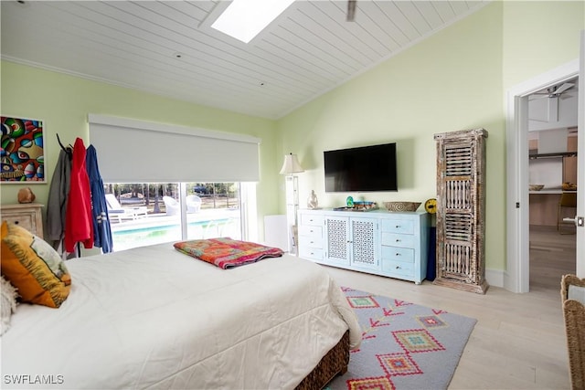 5880 Shady Oaks Ln, Naples, FL 34119 - bedroom with a skylight, wood finished floors, vaulted ceiling, and wood ceiling