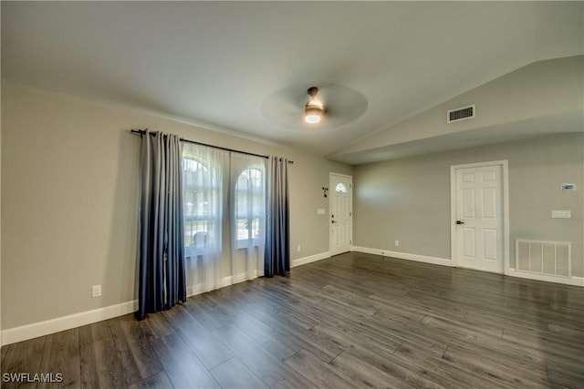14160 Cedardale St, Fort Myers, FL 33905 - foyer entrance with a ceiling fan, lofted ceiling, dark wood finished floors, and baseboards