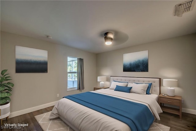 14160 Cedardale St, Fort Myers, FL 33905 - bedroom with baseboards, wood finished floors, and ceiling fan