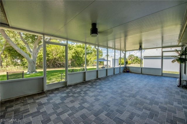 14160 Cedardale St, Fort Myers, FL 33905 - unfurnished sunroom with a ceiling fan