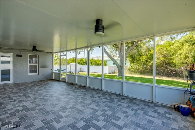 14160 Cedardale St, Fort Myers, FL 33905 - unfurnished sunroom with ceiling fan and plenty of natural light