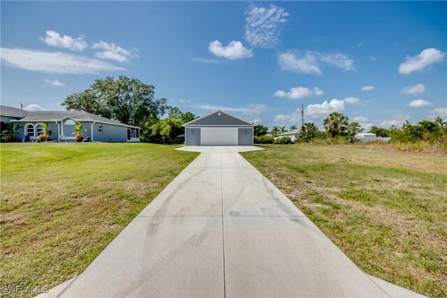 14160 Cedardale St, Fort Myers, FL 33905 - ranch-style house with a front lawn and concrete driveway