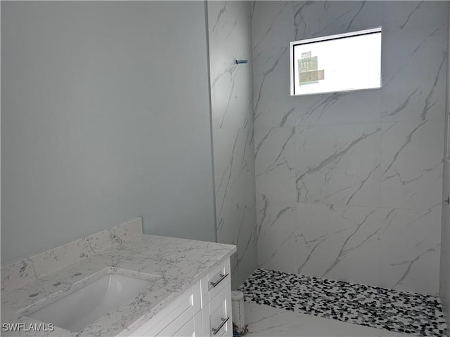 3346 10th Ave SE, Naples, FL 34117 - full bathroom featuring a marble finish shower, vanity, marble look tile flooring, and toilet
