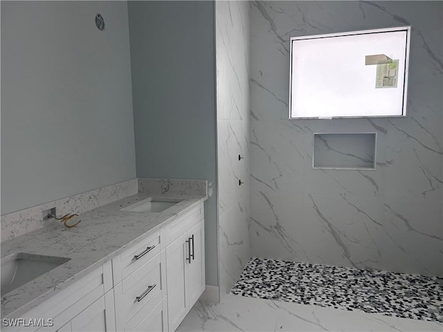 3346 10th Ave SE, Naples, FL 34117 - bathroom with double vanity, marble finish floors, and a marble finish shower