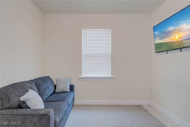 2337 Tangerine Ln, Naples, FL 34120 - living area featuring light colored carpet and baseboards