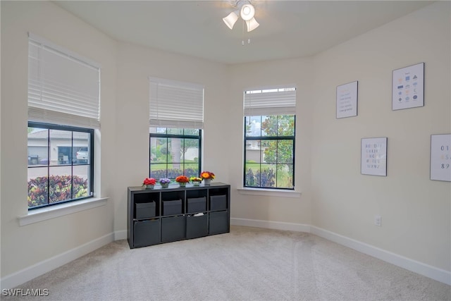 2337 Tangerine Ln, Naples, FL 34120 - carpeted spare room featuring ceiling fan and baseboards