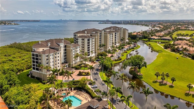 11640 Court Of Palms Unit 103, Fort Myers, FL 33908 - aerial view of apartment complex / building, a nearby body of water, and a pool area