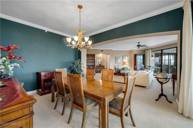 11640 Court Of Palms Unit 103, Fort Myers, FL 33908 - dining space featuring light carpet, ornamental molding, a chandelier, baseboards, and a ceiling fan
