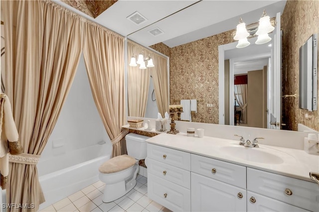 11640 Court Of Palms Unit 103, Fort Myers, FL 33908 - full bathroom featuring wallpapered walls, tile patterned floors, toilet, vanity, and shower / bath combo