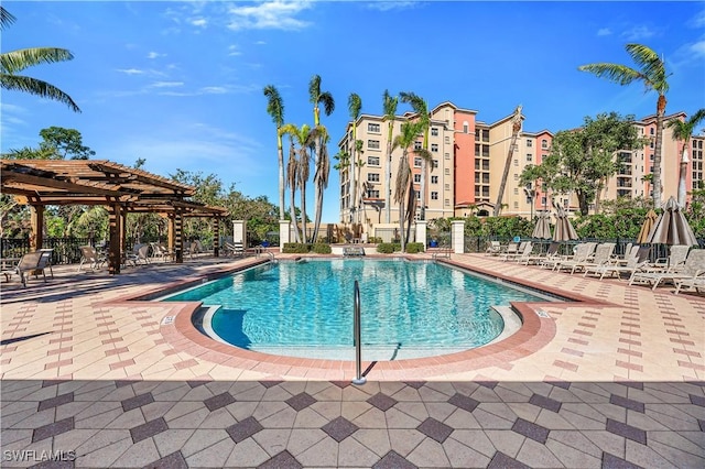 11640 Court Of Palms Unit 103, Fort Myers, FL 33908 - community pool with a pergola and a patio