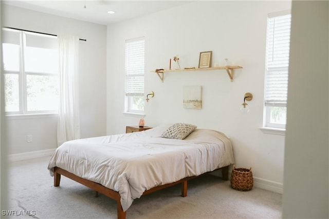 12083 Maiden Ln, Bonita Springs, FL 34135 - carpeted bedroom with baseboards