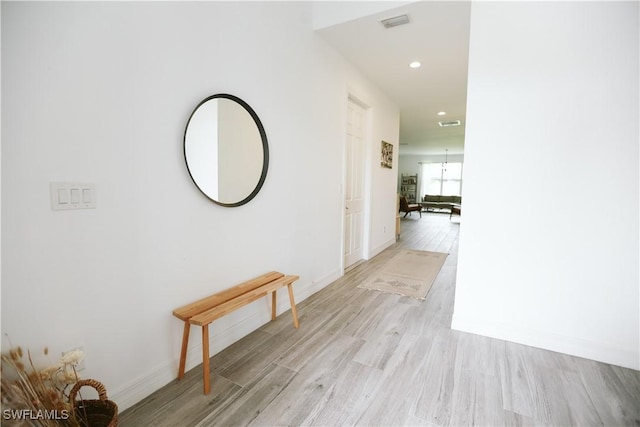 12083 Maiden Ln, Bonita Springs, FL 34135 - hallway with light wood-style floors, recessed lighting, and baseboards