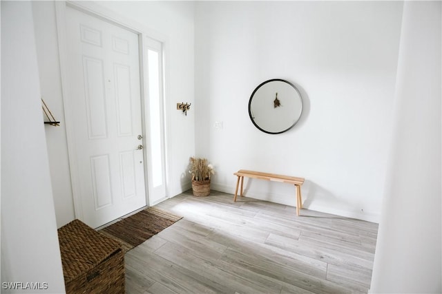 12083 Maiden Ln, Bonita Springs, FL 34135 - entryway featuring wood finished floors