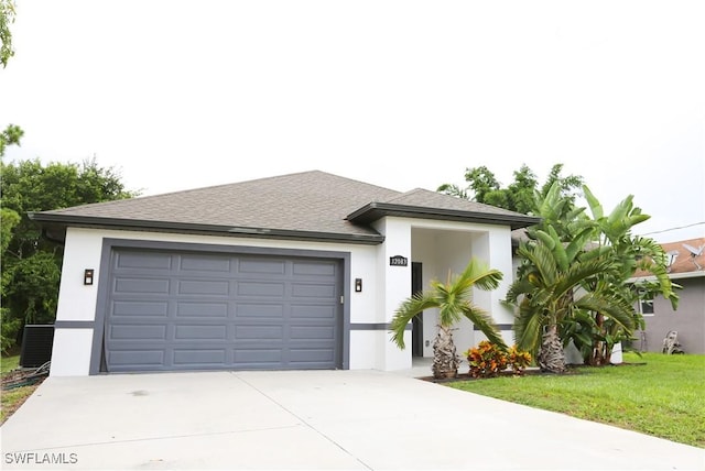 12083 Maiden Ln, Bonita Springs, FL 34135 - view of front of house featuring stucco siding, driveway, a shingled roof, central air condition unit, and an attached garage