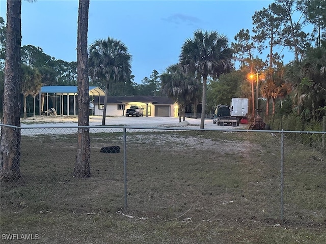 3550 Everglades Blvd S, Naples, FL 34117 - view of yard featuring a carport and a garage