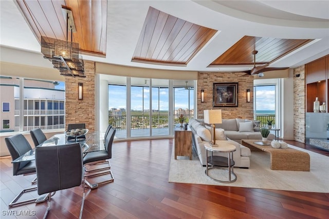 13675 Vanderbilt Dr Ph 1105, Naples, FL 34110 - living room featuring wooden ceiling and hardwood / wood-style flooring