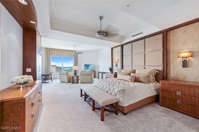 13675 Vanderbilt Dr Ph 1105, Naples, FL 34110 - bedroom with light colored carpet and a tray ceiling