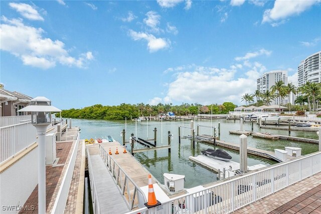 13675 Vanderbilt Dr Ph 1105, Naples, FL 34110 - dock area featuring boat lift and a water view