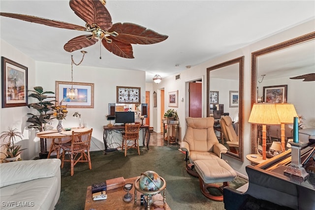 1415 Tropic Ter Unit 1415, North Fort Myers, FL 33903 - living area with ceiling fan and carpet floors
