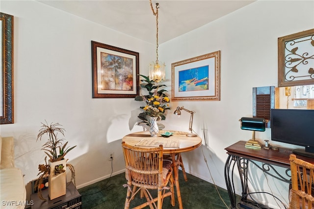 1415 Tropic Ter Unit 1415, North Fort Myers, FL 33903 - dining room with baseboards and dark colored carpet