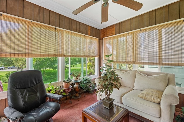 1415 Tropic Ter Unit 1415, North Fort Myers, FL 33903 - sunroom / solarium with carpet flooring and wooden walls