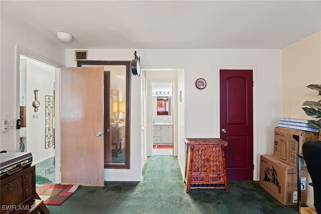 1415 Tropic Ter Unit 1415, North Fort Myers, FL 33903 - carpeted bedroom featuring connected bathroom