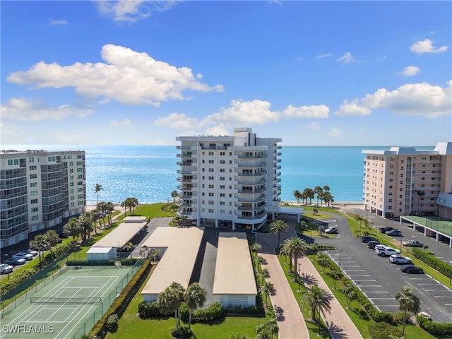 1036 S Collier Blvd Unit A103, Marco Island, FL 34145 - drone / aerial view of a large body of water and apartment complex / building