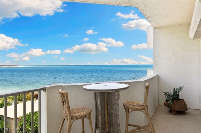 1036 S Collier Blvd Unit A103, Marco Island, FL 34145 - balcony featuring a water view
