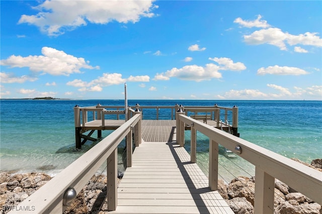 1036 S Collier Blvd Unit A103, Marco Island, FL 34145 - dock featuring view of water and beach