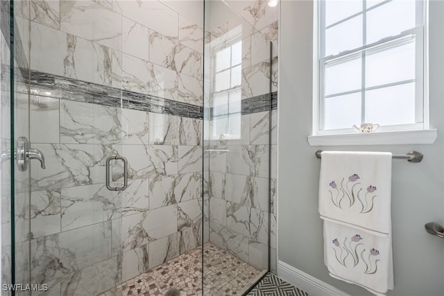 910 Gen George Patton Ave, Labelle, FL 33935 - bathroom featuring a stall shower and baseboards