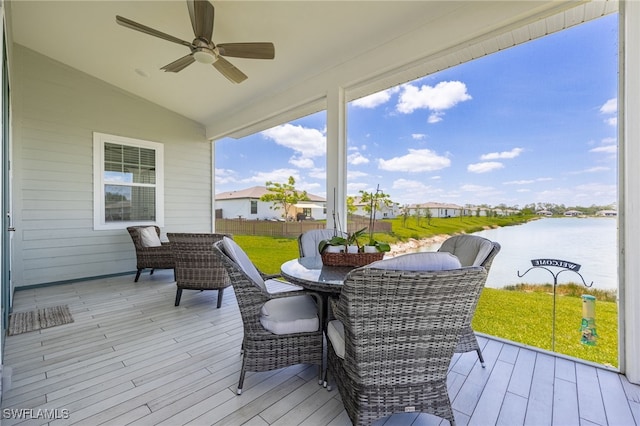 910 Gen George Patton Ave, Labelle, FL 33935 - wooden deck featuring a ceiling fan, a water view, and outdoor dining area