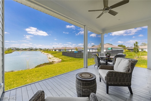 910 Gen George Patton Ave, Labelle, FL 33935 - wooden terrace featuring a ceiling fan, a water view, and outdoor dining space