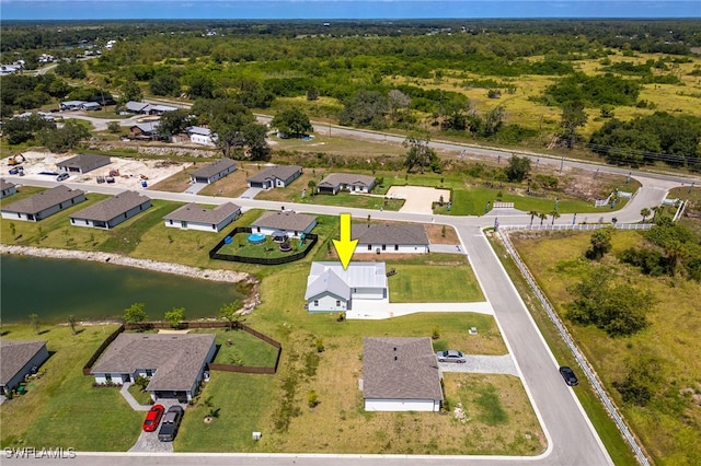 910 Gen George Patton Ave, Labelle, FL 33935 - aerial view of property and surrounding area with a nearby body of water and a heavily wooded area