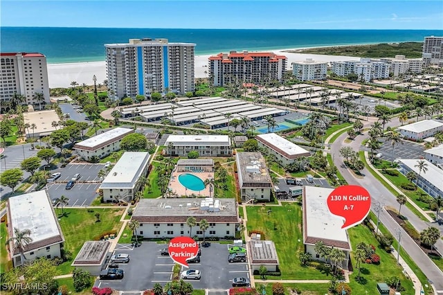 130 N Collier Blvd Unit A7, Marco Island, FL 34145 - view of urban area with a nearby body of water and a pool area