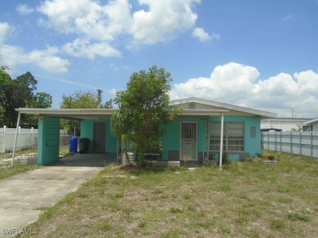 2956 Powell St, Fort Myers, FL 33901 - view of front of property featuring concrete driveway and an attached carport