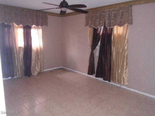 2956 Powell St, Fort Myers, FL 33901 - spare room featuring a ceiling fan and baseboards