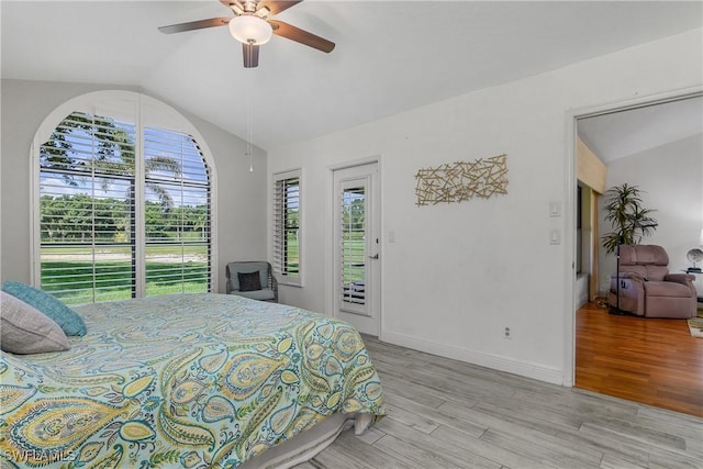 28908 Marsh Elder Ct, Bonita Springs, FL 34135 - bedroom with lofted ceiling, access to exterior, wood finished floors, ceiling fan, and baseboards
